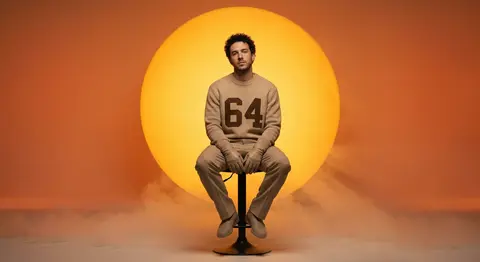 Kael Veyron, a poised neo-futurist vocalist with short tight curls and subtle st - AI生成图片 2