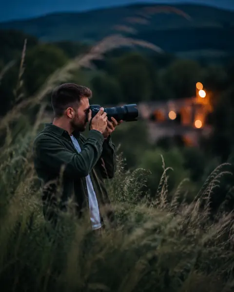 Cinematic medium shot of a young man with a trimmed beard and short brown hair, - AI生成图片 2