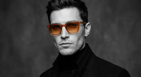A photorealistic luxury editorial close-up portrait of Orion Vale, a fictional f - AI生成图片 3