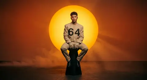 Kael Veyron, a poised neo-futurist vocalist with short tight curls and subtle st - AI生成图片 1