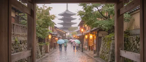 A serene rainy day in a traditional Japanese town, with a temple street leading - AI生成图片 1