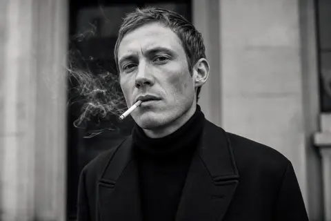 Ultra-realistic fashion black and white portrait of a man with short light hair, - AI生成图片 1