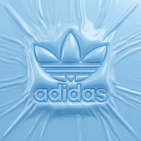 一张极简未来感品牌海报，正中央是立体浮雕风的 adidas 三叶草 logo 与小写 “adidas” 字样，整体像由半透明充气塑料/PVC/乳胶材质制成，表面 - AI生成图片 1