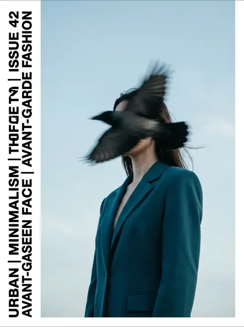 Editorial photography, a woman wearing a structured deep teal blazer standing ag - AI生成图片 1