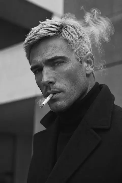 Ultra-realistic high-fashion black-and-white portrait of a striking man named Ad - AI生成图片 4
