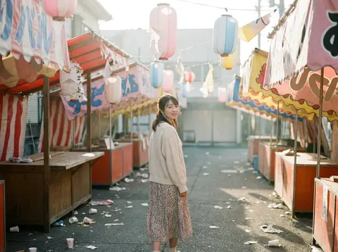 A beautiful Japanese woman walking through an empty festival street the morning - AI生成图片 1