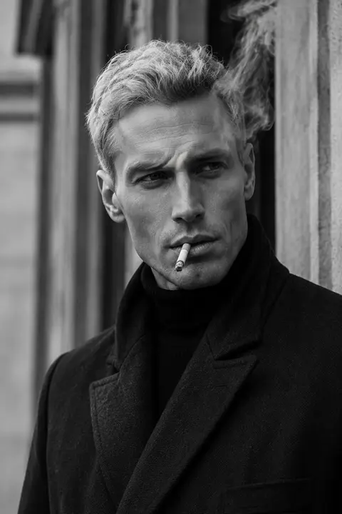 Ultra-realistic high-fashion black-and-white portrait of a striking man named Ad - AI生成图片 2