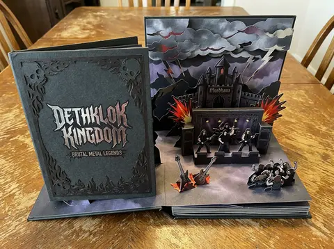 Create a Metalocalypse-themed 3D pop-up papercraft storybook diorama on rustic t - AI生成图片 2