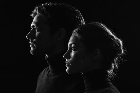 Monochrome fine-art editorial portrait of a man and woman arranged in perfect ta - AI生成图片 1