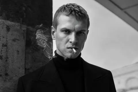 Ultra-realistic fashion black and white portrait of a man with short light hair, - AI生成图片 2