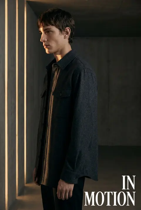 Luxury fashion editorial. Main Subject: Young male model wearing a charcoal over - AI生成图片 2