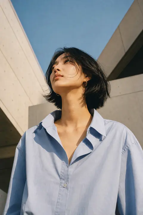 Low-angle fashion editorial shot of an East Asian woman with a short black bob h - AI生成图片 3