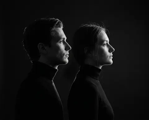 Ultra-minimal fine art editorial portrait in monochrome: a man and a woman align - AI生成图片 1