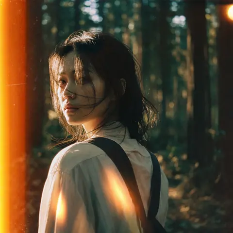 A moody 35mm film-still portrait of an Asian woman paused mid-turn in a secluded - AI生成图片 3