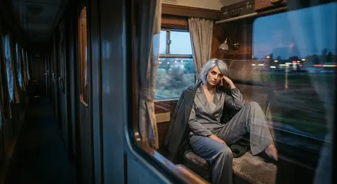 Hyper-detailed cinematic editorial portrait of a striking silver-haired young tr - AI生成图片 2