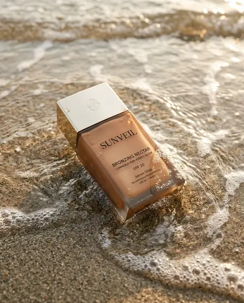 Ultra-realistic summer skincare product photography featuring a bronzing drop bo - AI生成图片 1