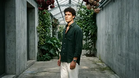 A hyper-realistic cinematic portrait of a fictional young man with a commanding, - AI生成图片 1